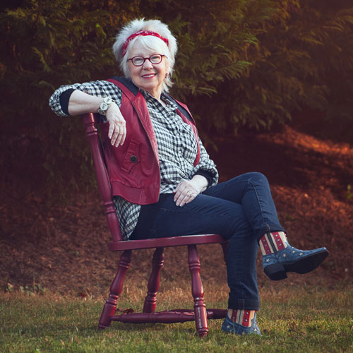Cute Patsy Clairmont sitting on chair