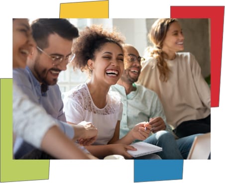 Professional woman learning and collaborating in a group setting.